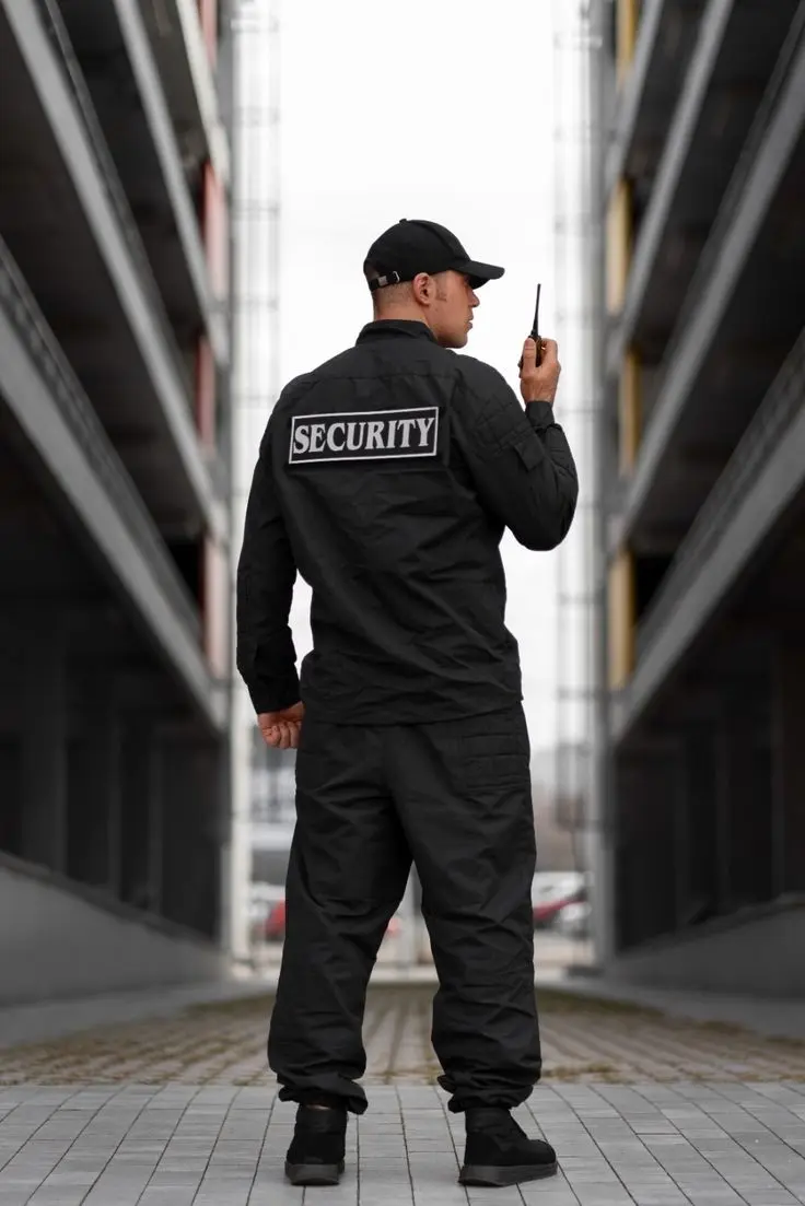 Uniformed XpressGuards security officer on patrol
